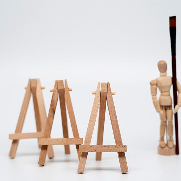 Prime-Art-3-Pocket-Easels-with-a-Manikin-Standing-next-to-them
