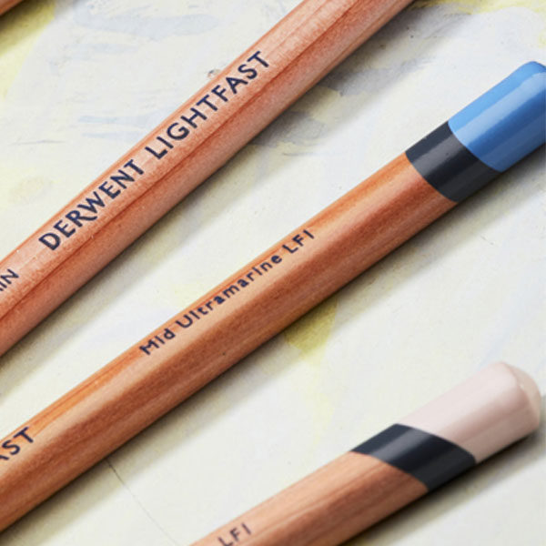 Derwent-Lightfast-Oil-based-Coloured-Pencils-on-table