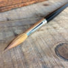Kolinsky-sable-Brush-on-wood-table