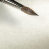 Hahnemuhle-Sumi-e-Paper-Sheet-with-paint-brush-on-it