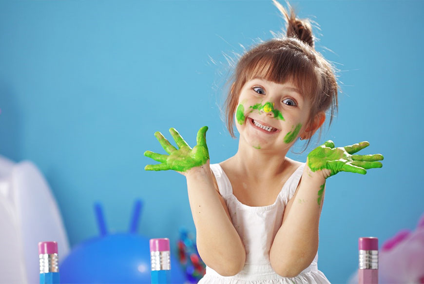 Small-Girl-with-Paint-on-her-hands-and-face